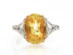 4ct oval yellow sapphire and diamond trillion three stone ring
