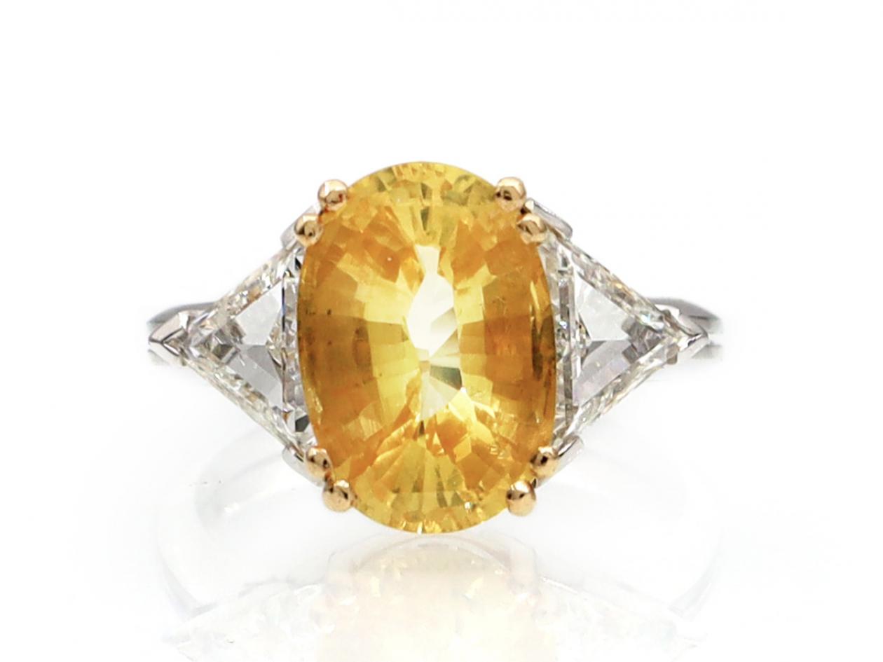 4ct oval yellow sapphire and diamond trillion three stone ring