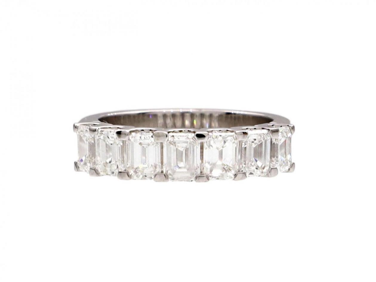 18kt white gold and diamond emerald cut seven stone ring