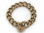 1971 heavy 9kt yellow gold curb bracelet with heart lock