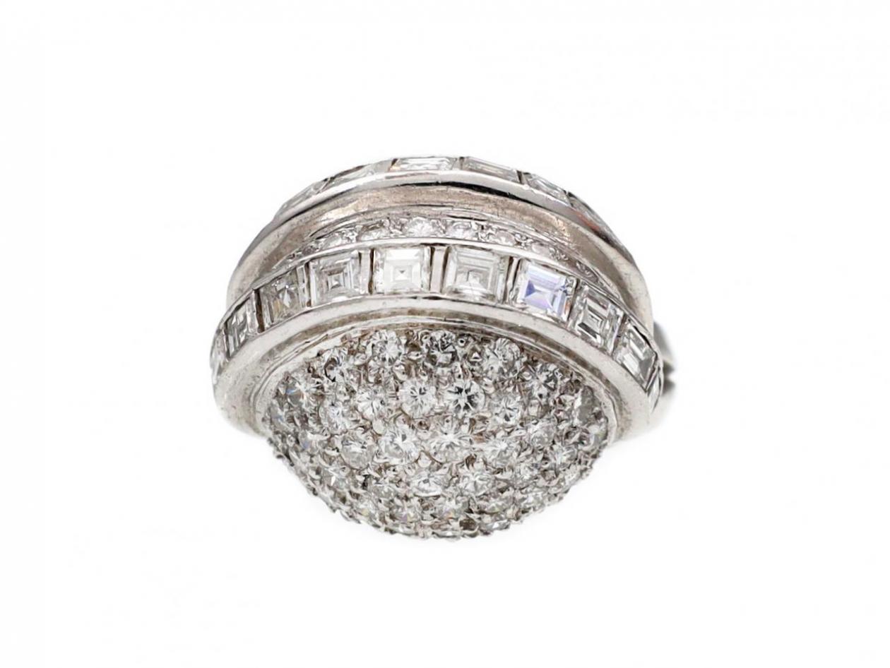 1940s American diamond set globe ring in platinum