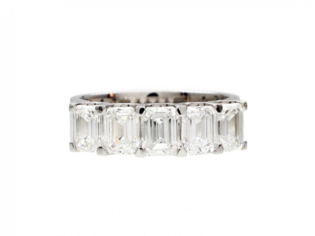 Five stone emerald cut diamond ring in 18kt white gold