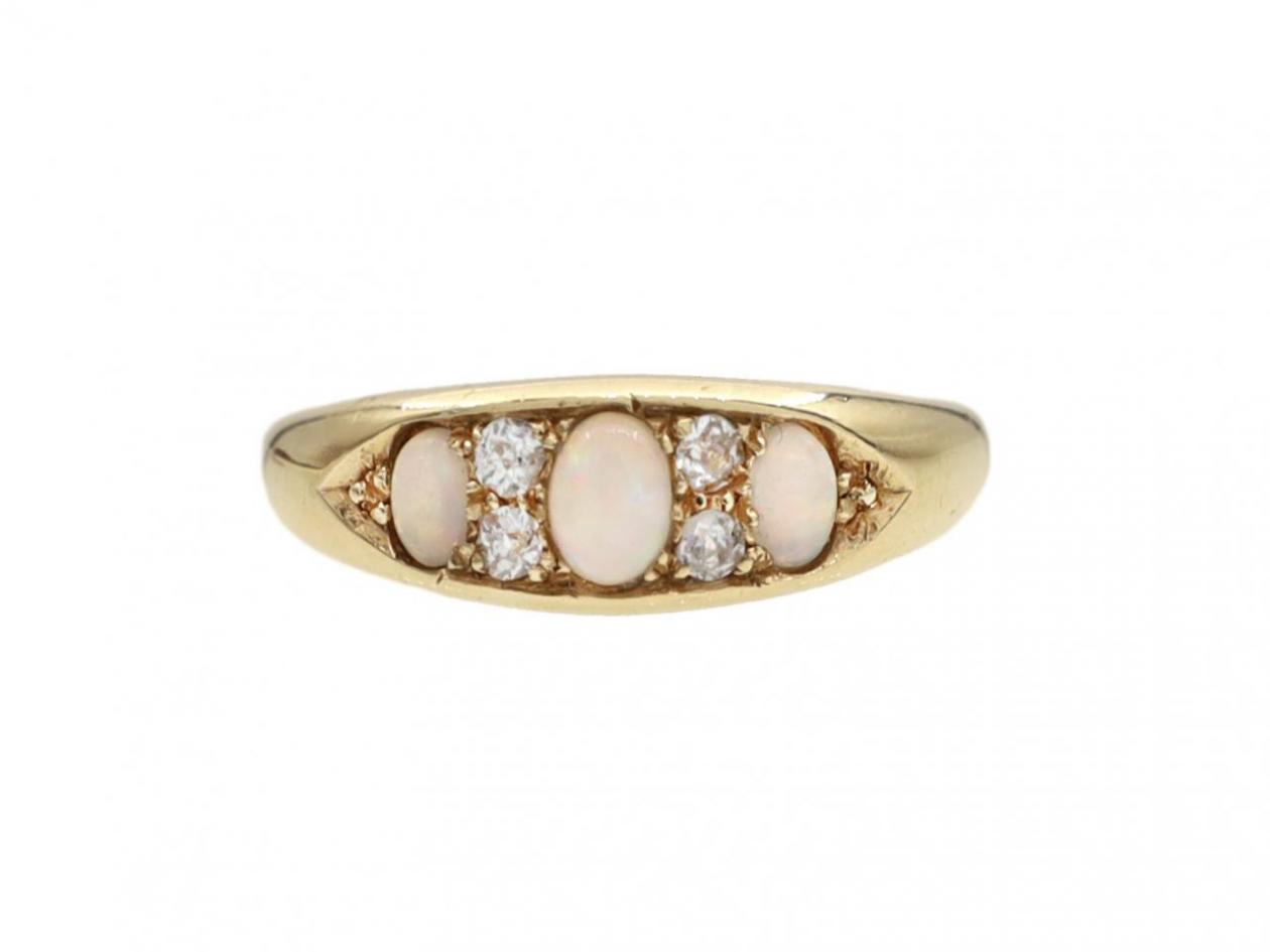 1903 opal and diamond three stone ring in 18kt yellow gold