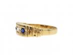 1882 diamond and sapphire three stone ring in gold