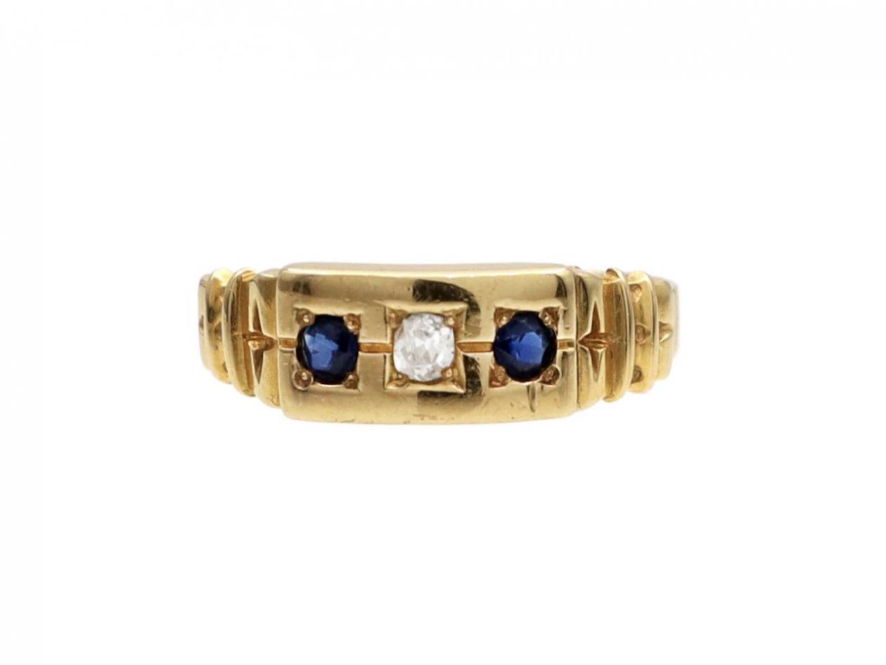 1882 diamond and sapphire three stone ring in gold