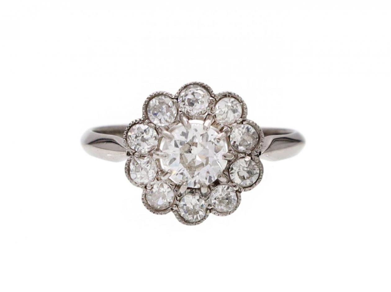 Antique platinum diamond floral cluster ring