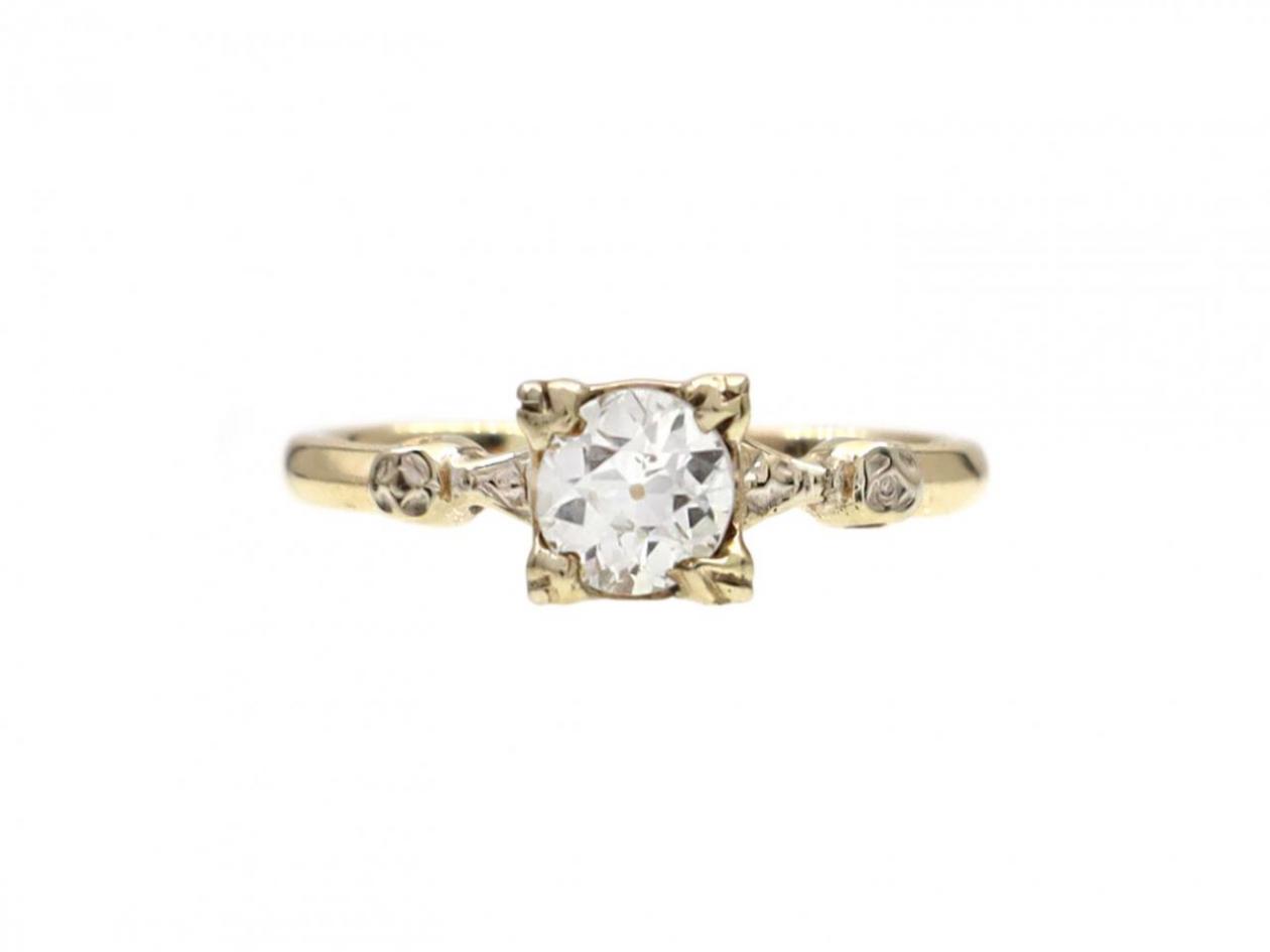 Vintage diamond solitaire engagement ring in 14kt yellow gold