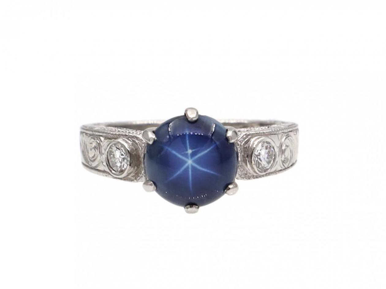Vintage synthetic star sapphire and diamond ring in platinum