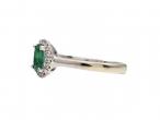 Vintage emerald and diamond oval cluster ring in 14kt white gold