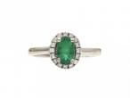 Vintage emerald and diamond oval cluster ring in 14kt white gold