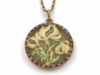 Art Nouveau plique-à-jour flower locket in 18kt yellow gold