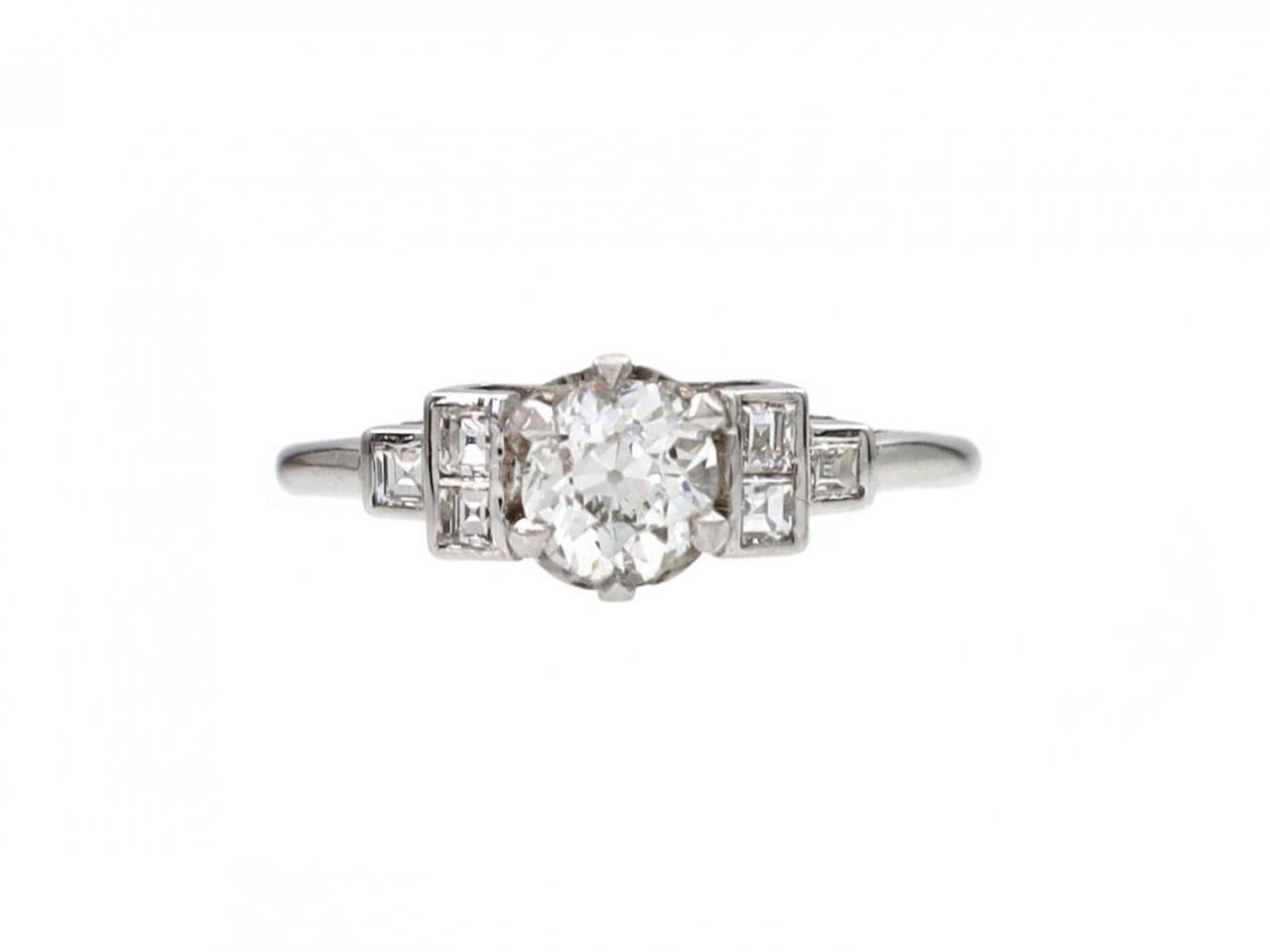 Art Deco diamond flanked solitaire engagement ring