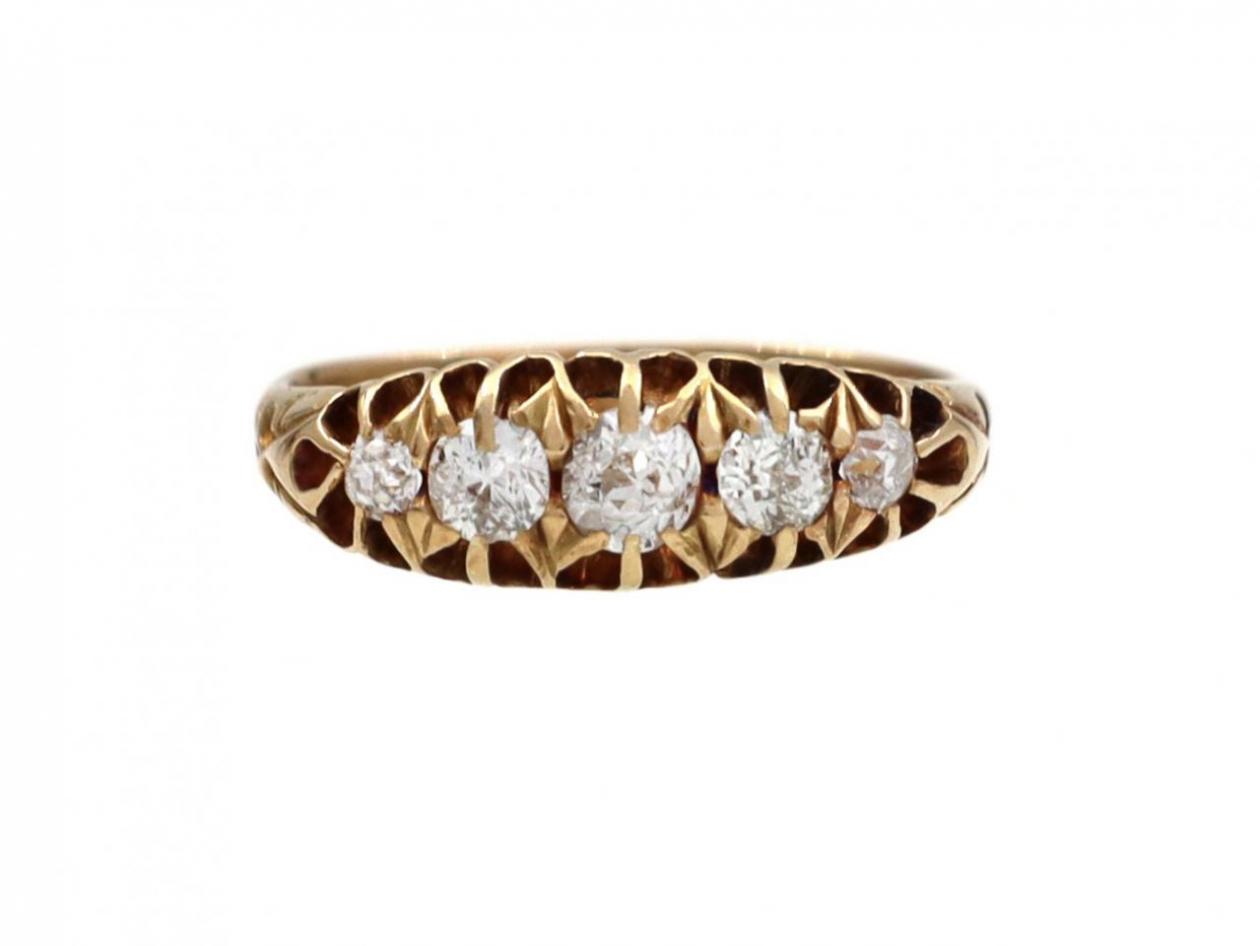 Antique graduating five stone diamond ring in yellow gold