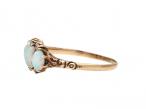 Antique opal and diamond four stone ring in yellow gold