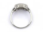 Long's Art Deco 18kt white gold and diamond three stone ring