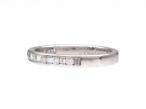 Baguette and round diamond half eternity ring in 18kt white gold
