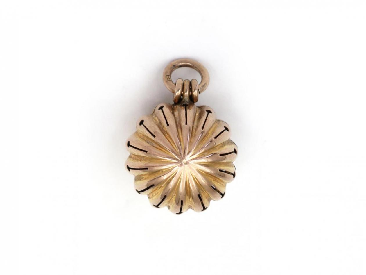 Antique 9kt yellow gold radiating ribbed pomander pendant