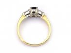 Contemporary sapphire and diamond three stone ring in gold
