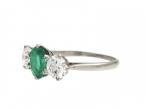 Vintage emerald and diamond three stone ring in platinum