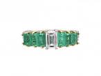 Retro emerald cut diamond and emerald seven stone ring