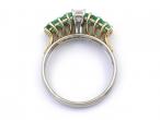 Retro emerald cut diamond and emerald seven stone ring