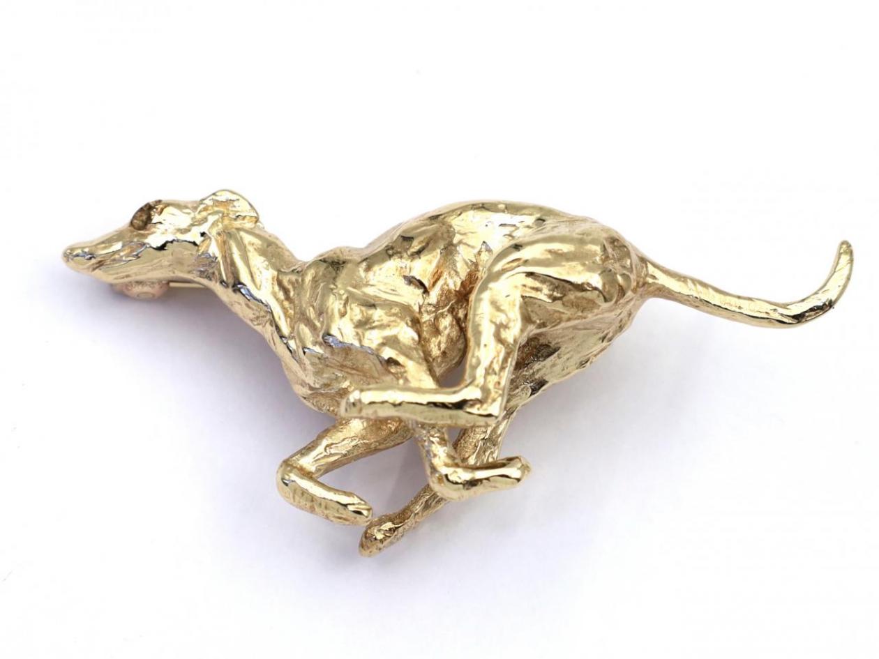 Retro sprinting greyhound brooch in yellow gold