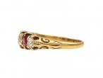 1896 diamond and ruby five stone carved ring in 18kt yellow gold
