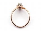 Antique diamond set bow ring in platinum and rose gold
