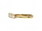 Modern five stone diamond ring in 18kt yellow gold