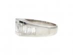 Princess and baguette cut diamond ring in platinum
