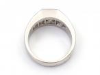 Princess and baguette cut diamond ring in platinum
