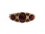 Vintage garnet carved ring in 9kt yellow gold