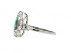 Art Deco style emerald and diamond octagonal cluster ring in platinum