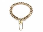 1989 hollow curb link bracelet with heart lock in 9kt yellow gold