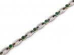 Vintage emerald cabochon, calibre sapphires and diamond line bracelet