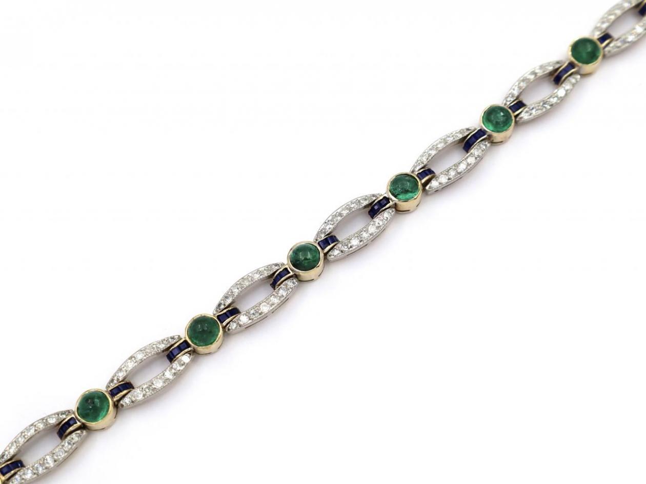 Vintage emerald cabochon, calibre sapphires and diamond line bracelet