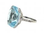 Vintage aquamarine solitaire cocktail ring with diamond shoulders