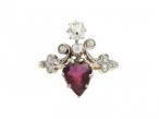 Edwardian ruby and diamond two stone cluster ring