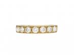 Contemporary diamond set half eternity ring in 18kt yellow gold