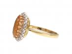 Vintage imperial topaz and diamond elongated oval cluster ring