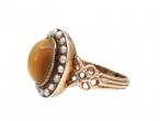 Antique cat's eye quartz and seed pearl oval cluster ring in gold