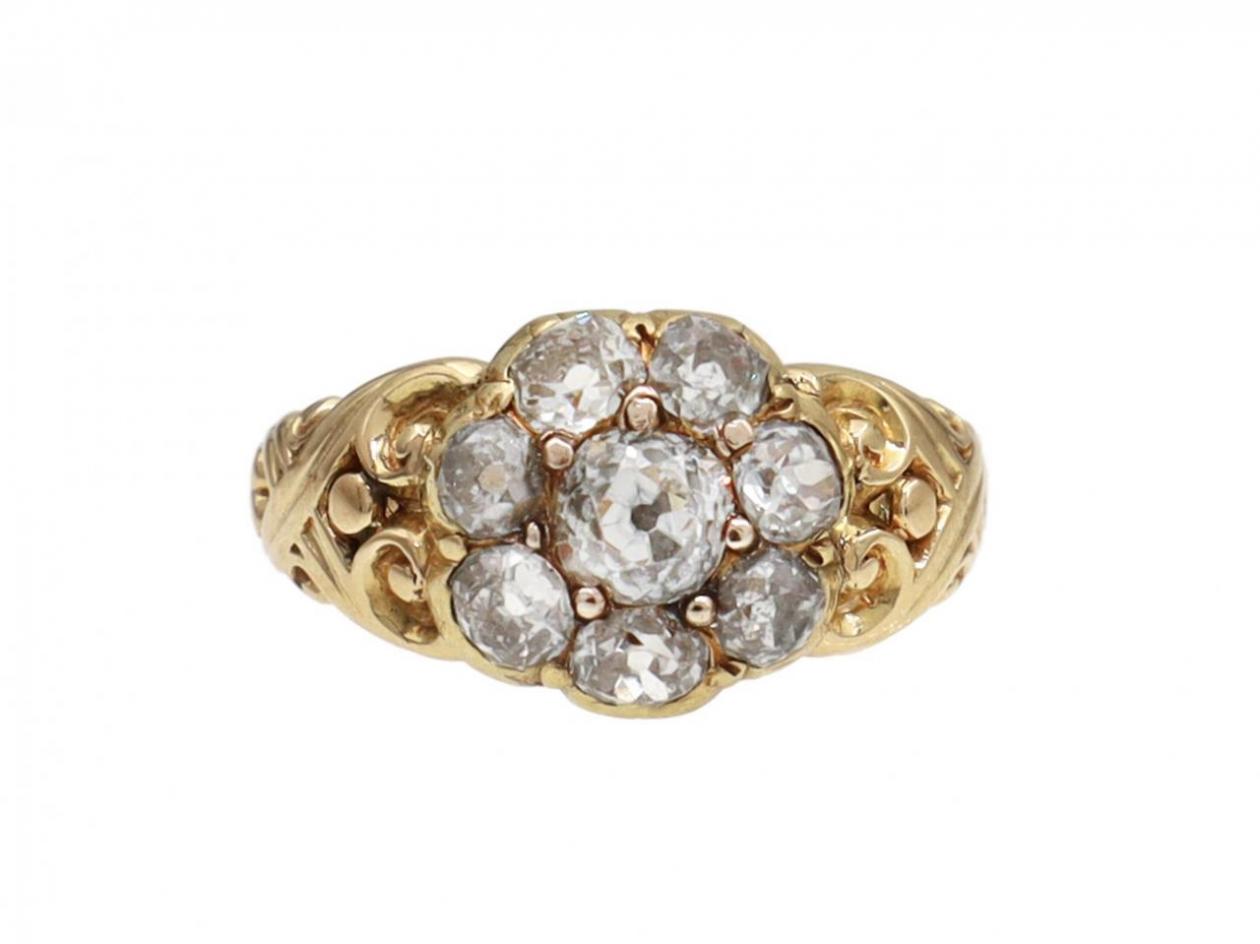 Antique diamond coronet cluster ring with carved shoulders