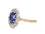 Antique oval sapphire and diamond flower cluster ring in gold