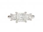 Vintage Princess cut diamond graduating three stone engagement ring