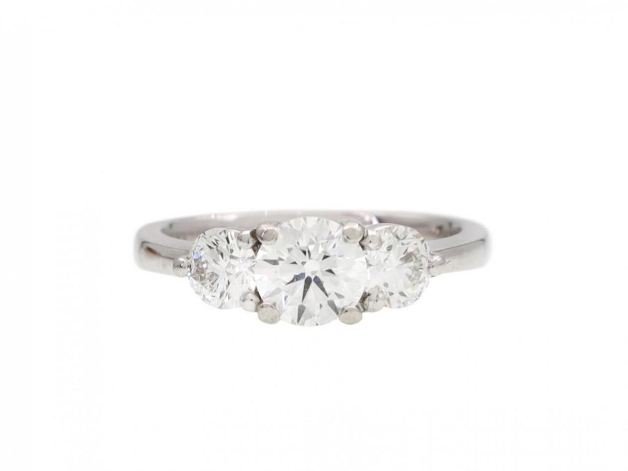 Contemporary diamond three stone ring in platinum