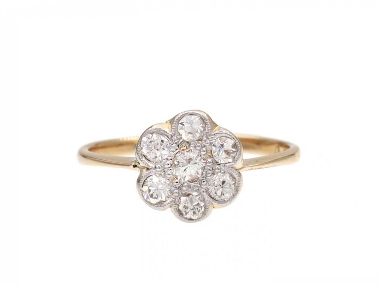 Edwardian diamond set daisy cluster engagement ring in gold
