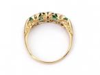 Victorian four stone emerald and diamond carved ring in gold