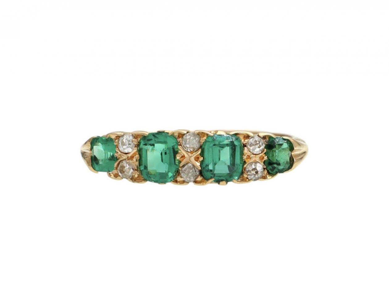Victorian four stone emerald and diamond carved ring in gold