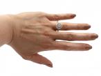 Contemporary diamond cluster engagement ring in 18kt white gold