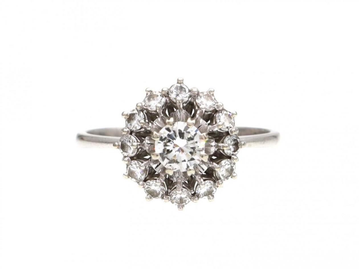 Contemporary diamond cluster engagement ring in 18kt white gold